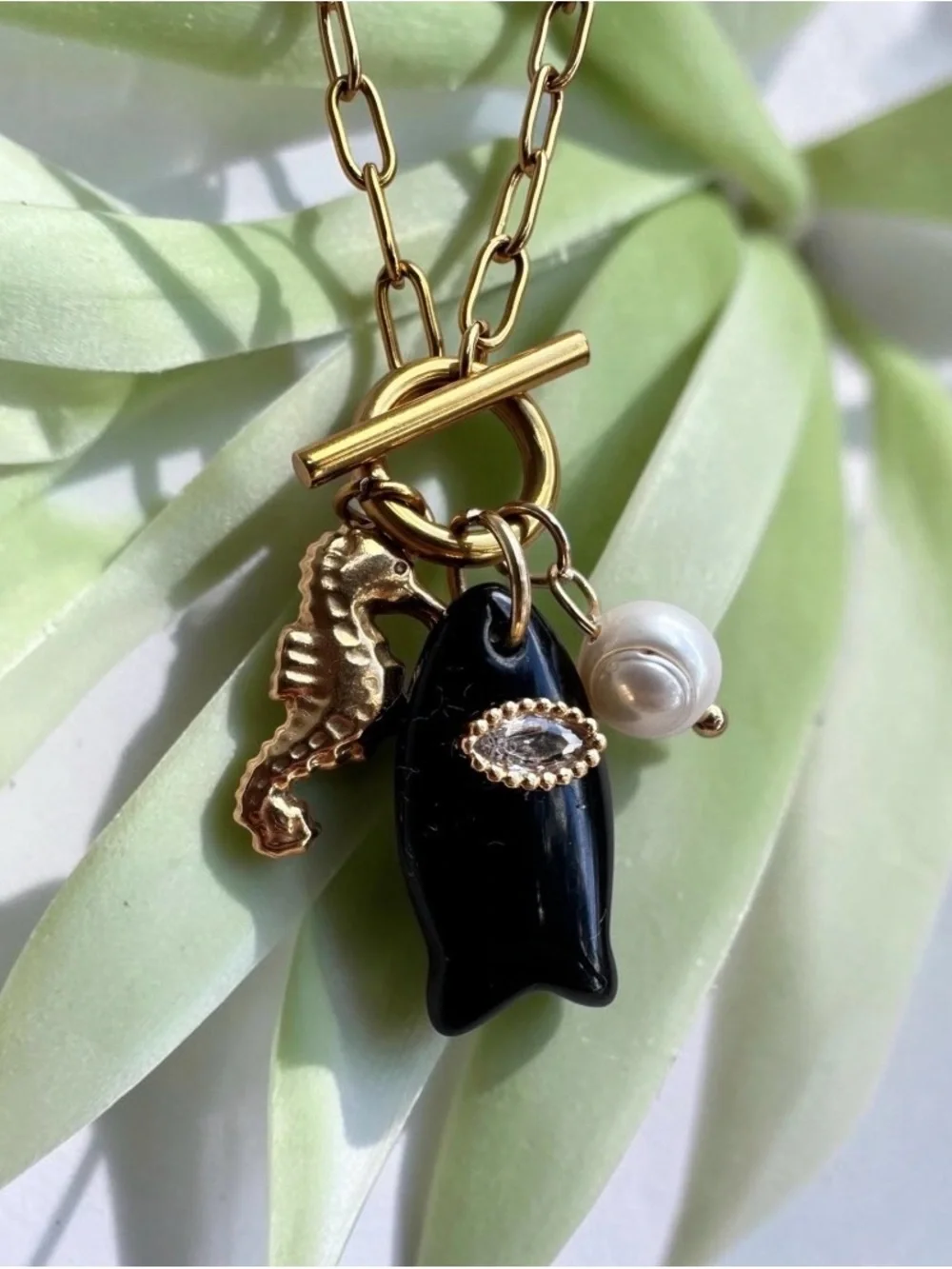 Black Fish Pendant, Pearl & Seahorse Charms on Paperclip Chain